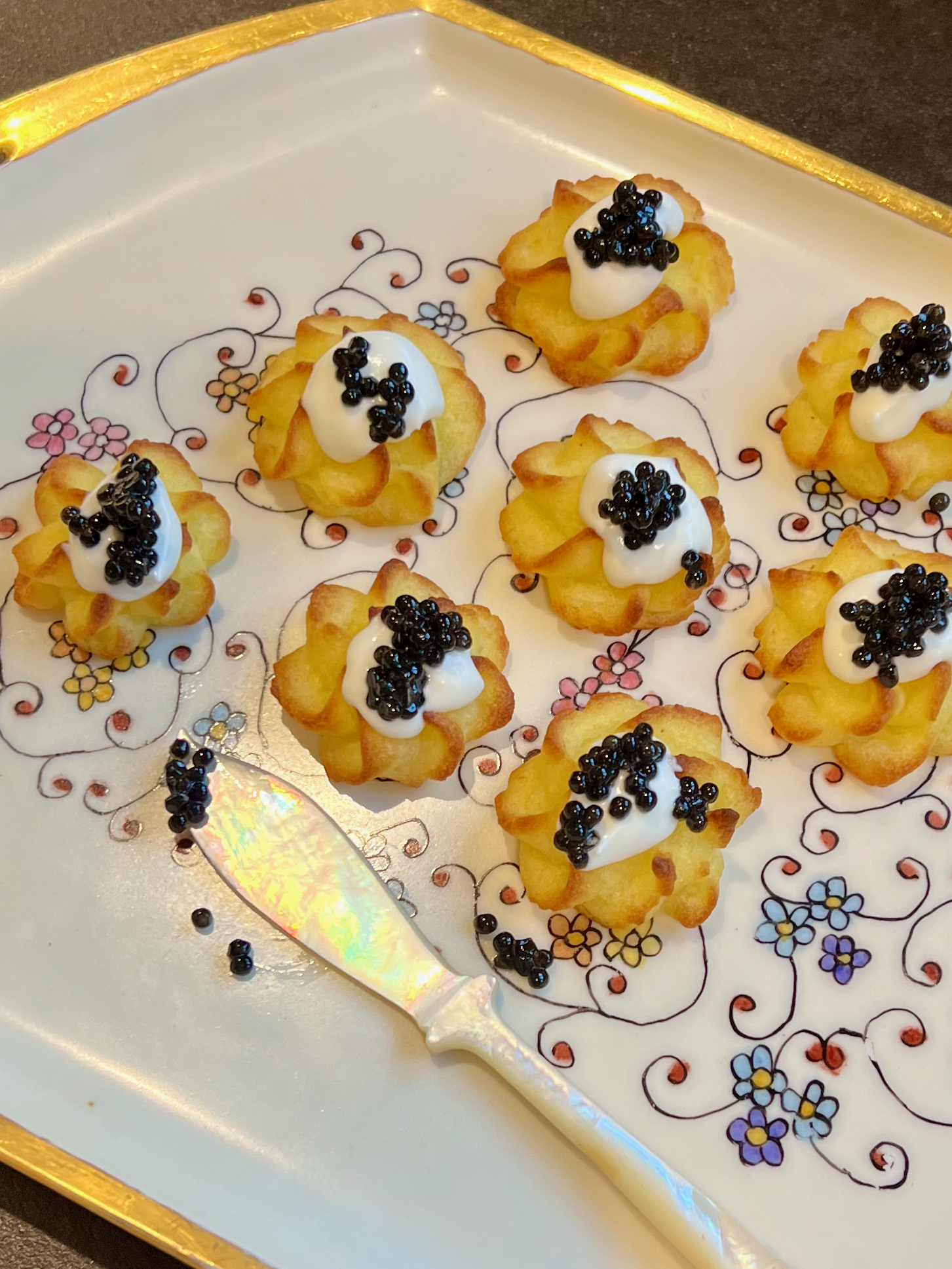 Duchess potatoes with crème fraîche and caviar