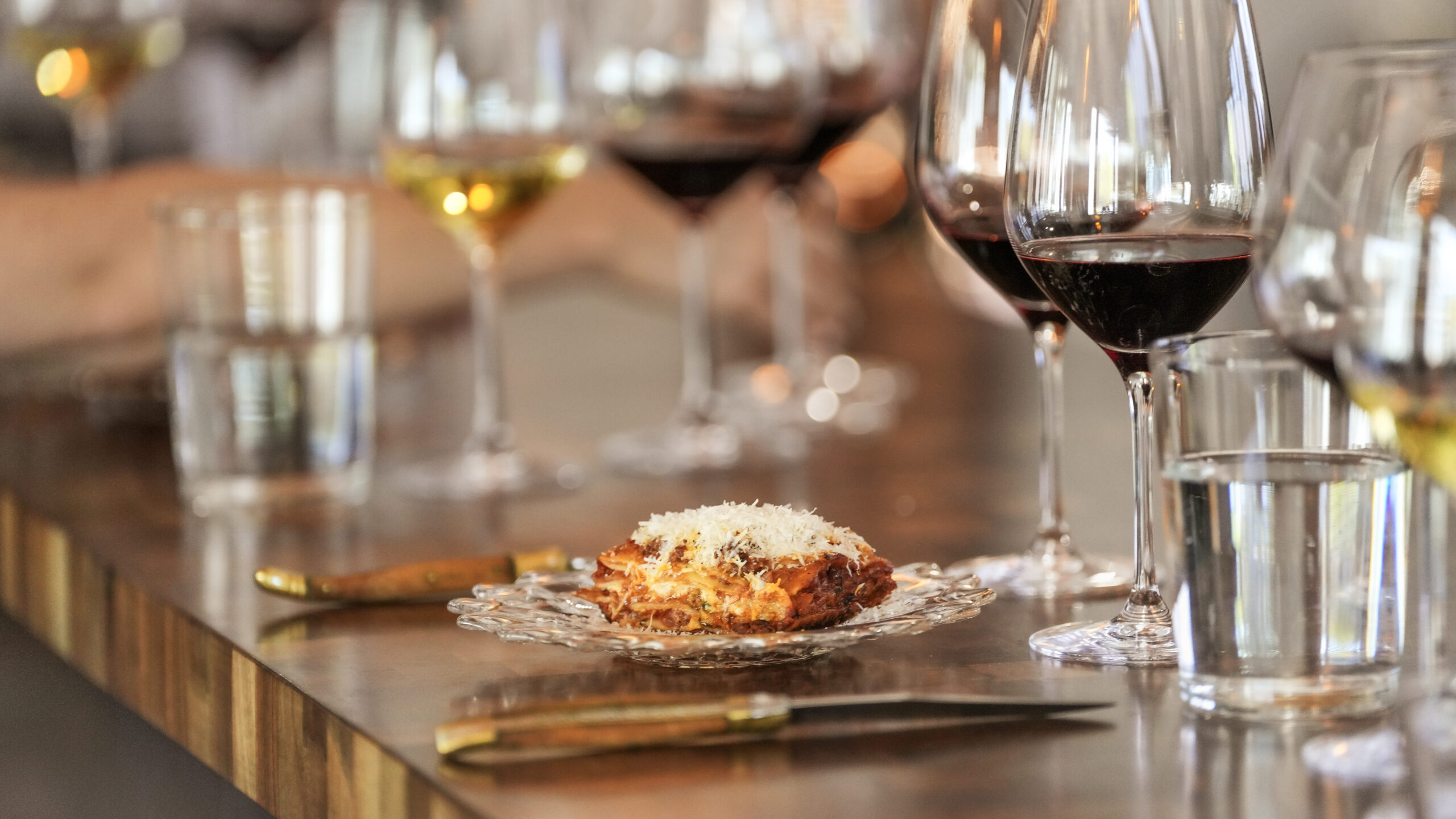 May 2024 Cuff - Mom's Lasagna and Wine Glasses